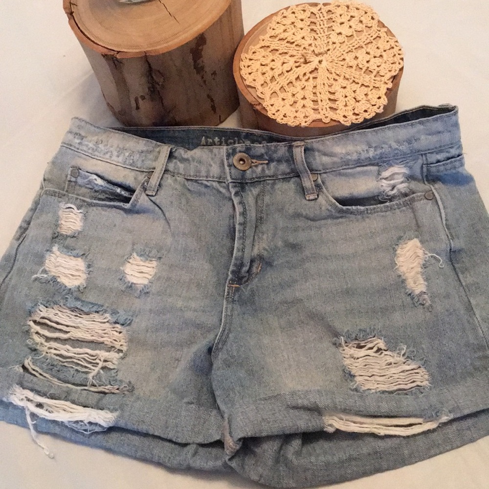 Faded torn jeans shorts